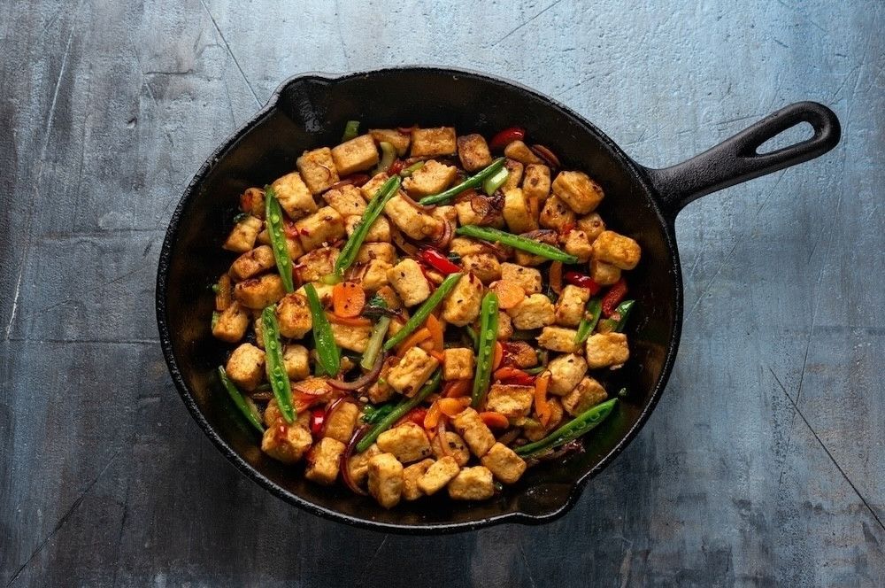 ENOUGH's mycoprotein is used to create a variety of alternative meat products, including stir-fry dishes, burgers, sausages, and more, offering a sustainable option for meat lovers.