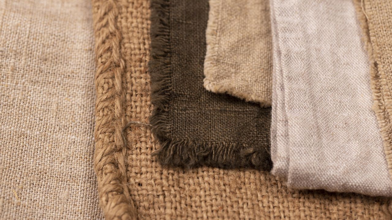 Flat lay of monochromatic assortment of textiles